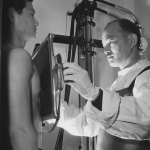 Former Californian Dr. Fugikawa examining a patient
