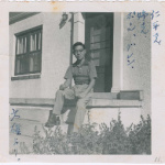 Lawrence Miwa poses on porch